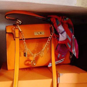 Luxe Statement Handbag with Gold Charm Chain & Scarf Accent