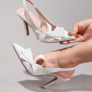 Elegant White Sling-back Heels with Statement Bow
